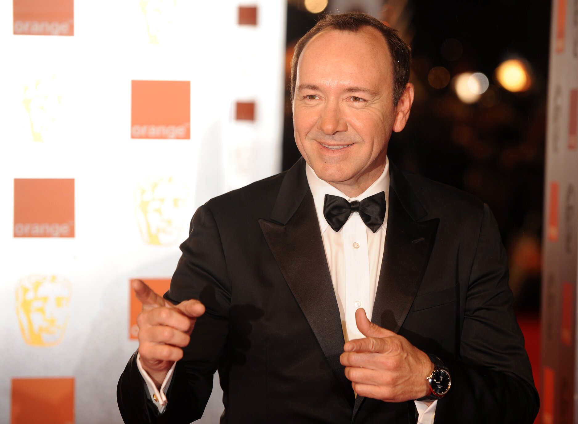 Kevin Spacey poses for photographers as he arrives for the British Academy of Film Awards (BAFTA) at the Royal Opera House in central London
