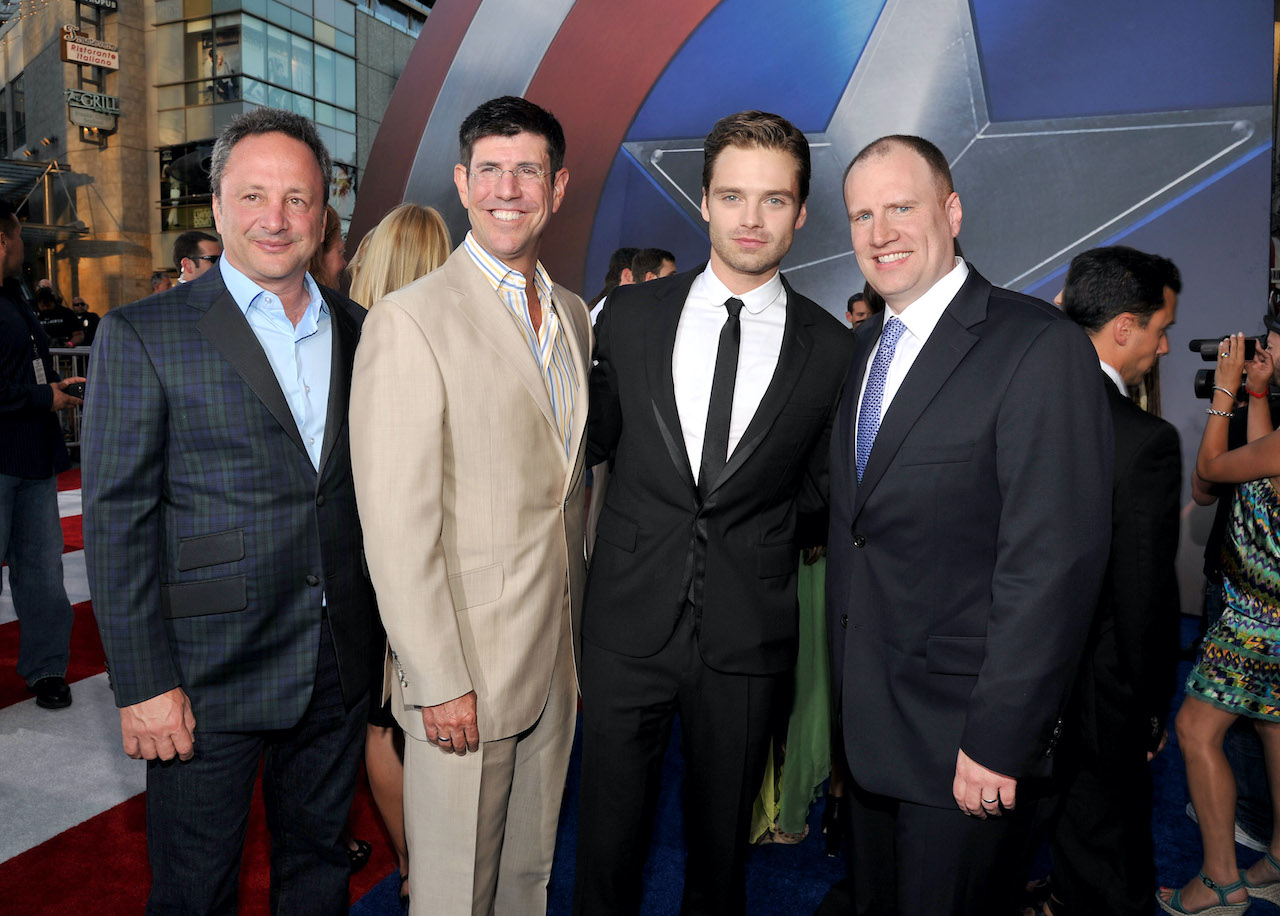 (L-R) Executive producer Louis D'Esposito, Chairman of The Walt Disney Studios Rich Ross, actor Sebastian Stan and President of Production, Marvel Studios Kevin Feige attend the "Captain America: The First Avenger" Los Angeles Premiere