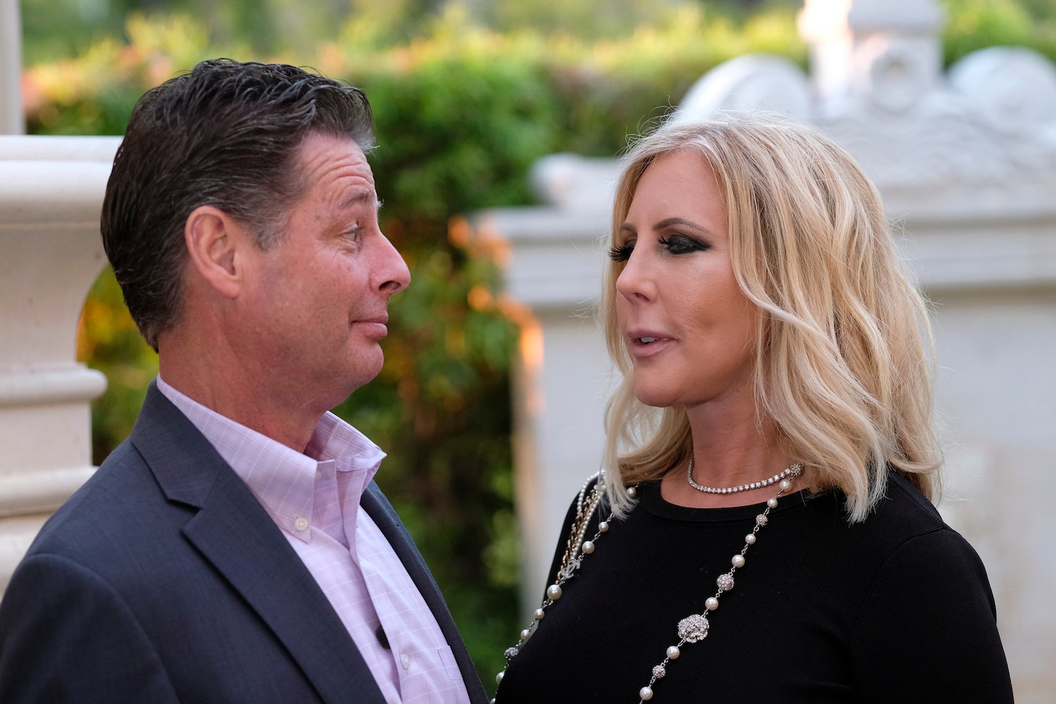 Steve Lodge looking at Vicki Gunvalson in a scene from 'RHOC'