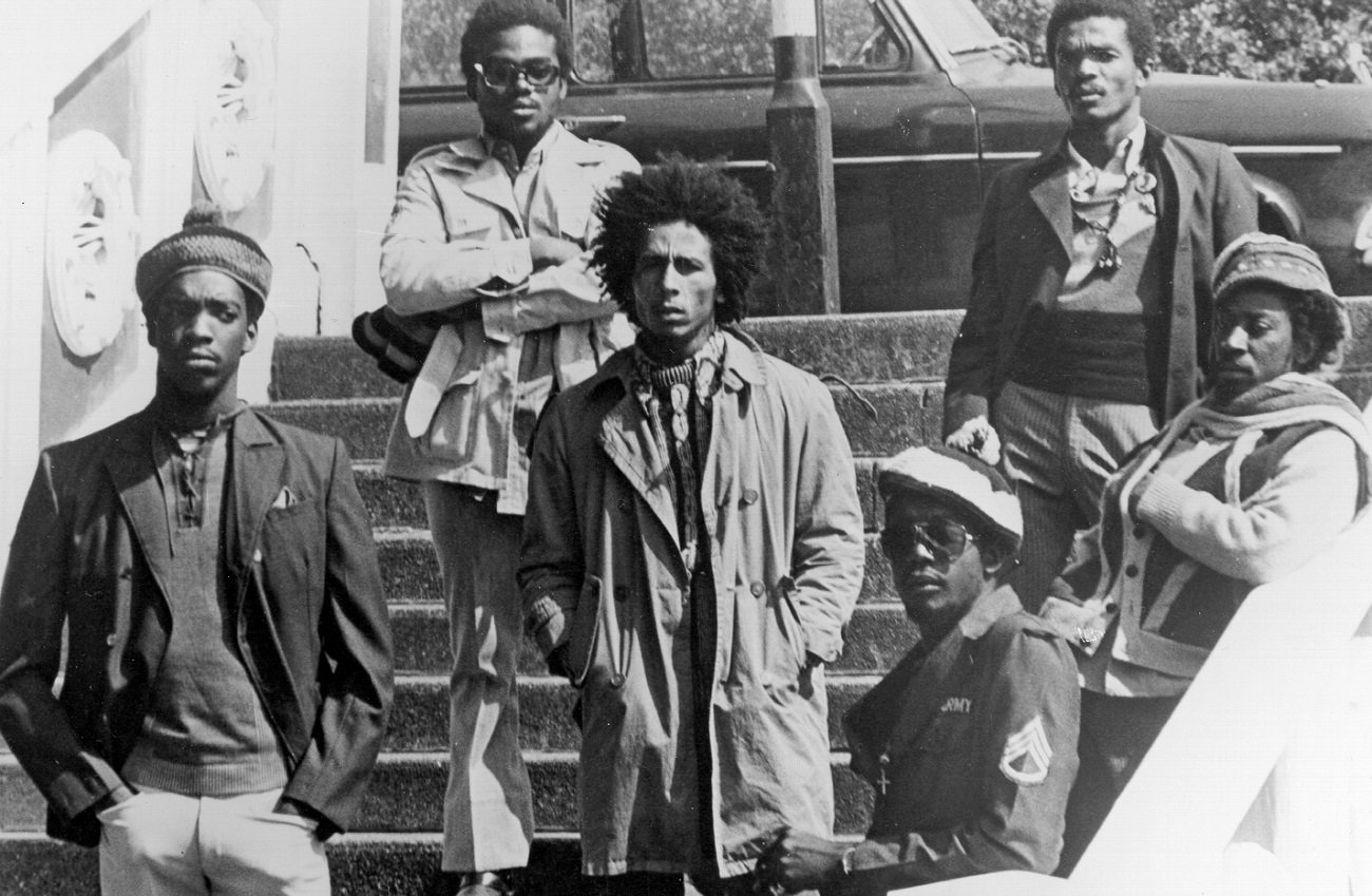 The Wailers pose and scowl at the camera off a London street, 1973
