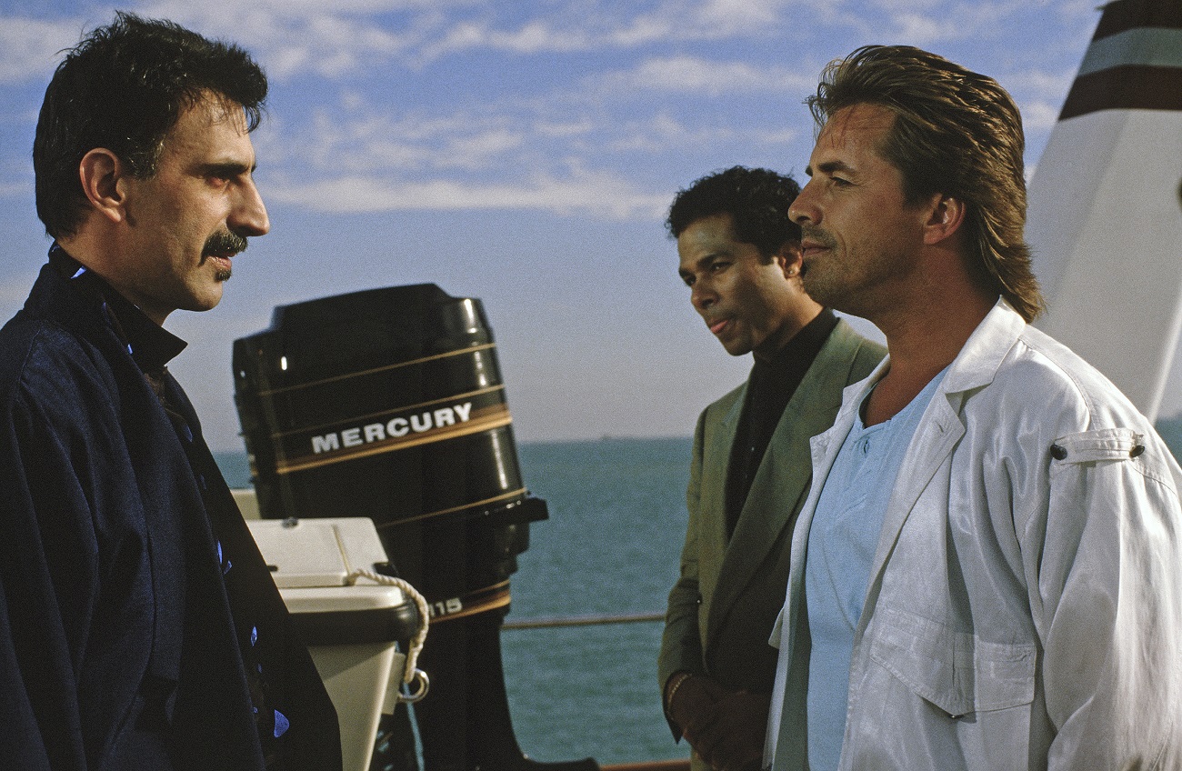 Frank Zappa talks to Philip Michael Thomas and Don Johnson on a boat in a 'Miami Vice' scene