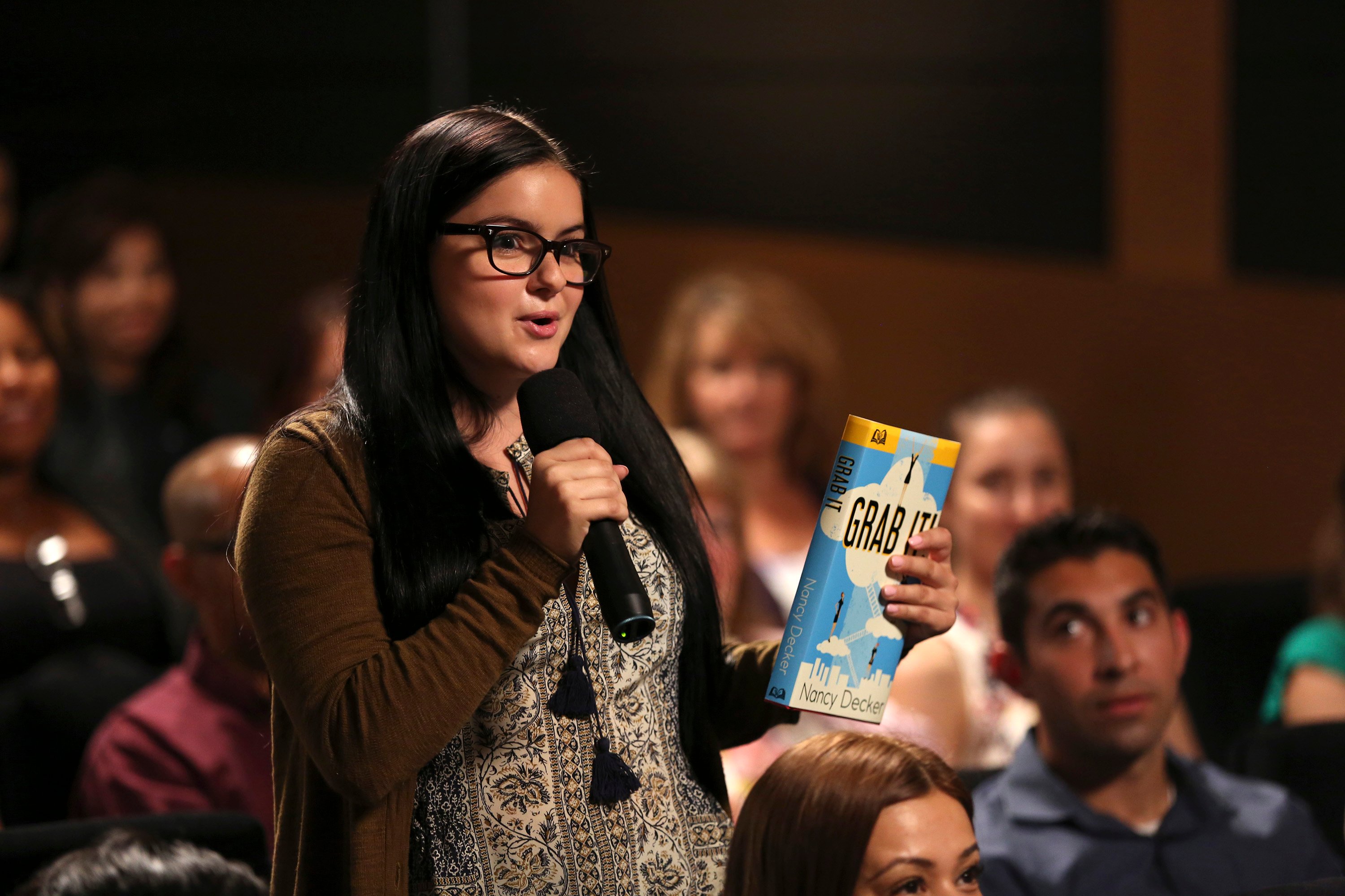 Ariel Winter as Alex Dunphy, standing in a room, 'Modern Family' episode titled 'Grab It'