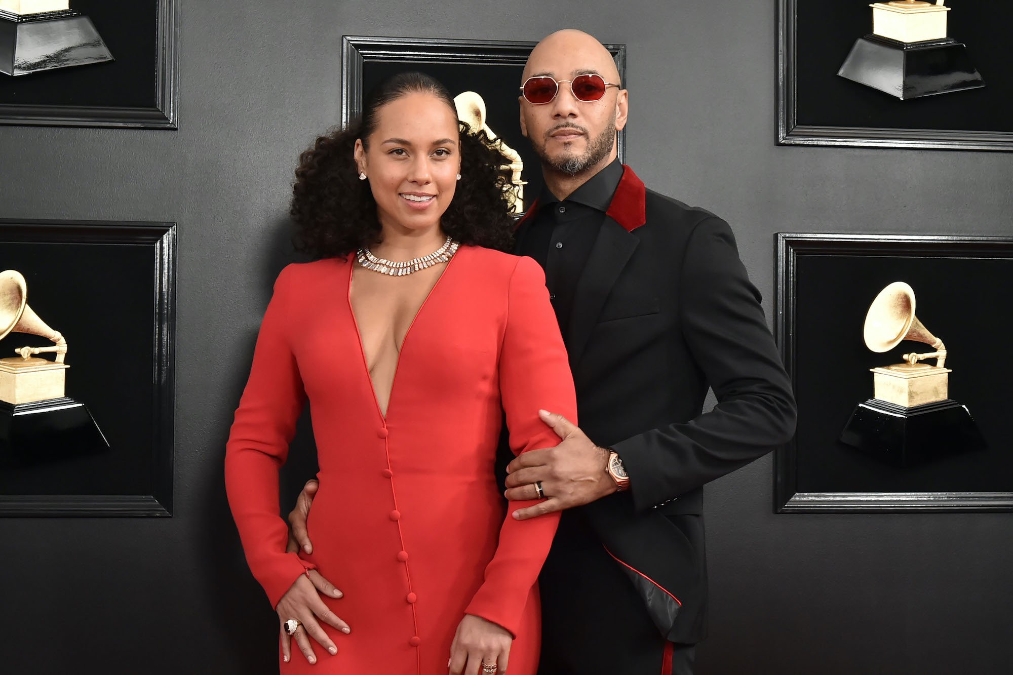 Alicia Keys and Swizz Beatz smiling