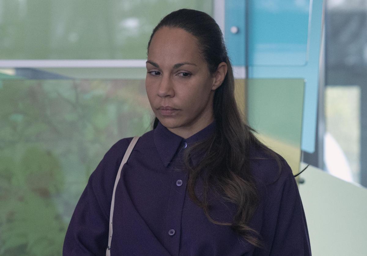 Amanda Brugel in a purple dress looks concerned as Rita in 'The Handmaid's Tale' Season 4 Episode 2, 'Nightshade'