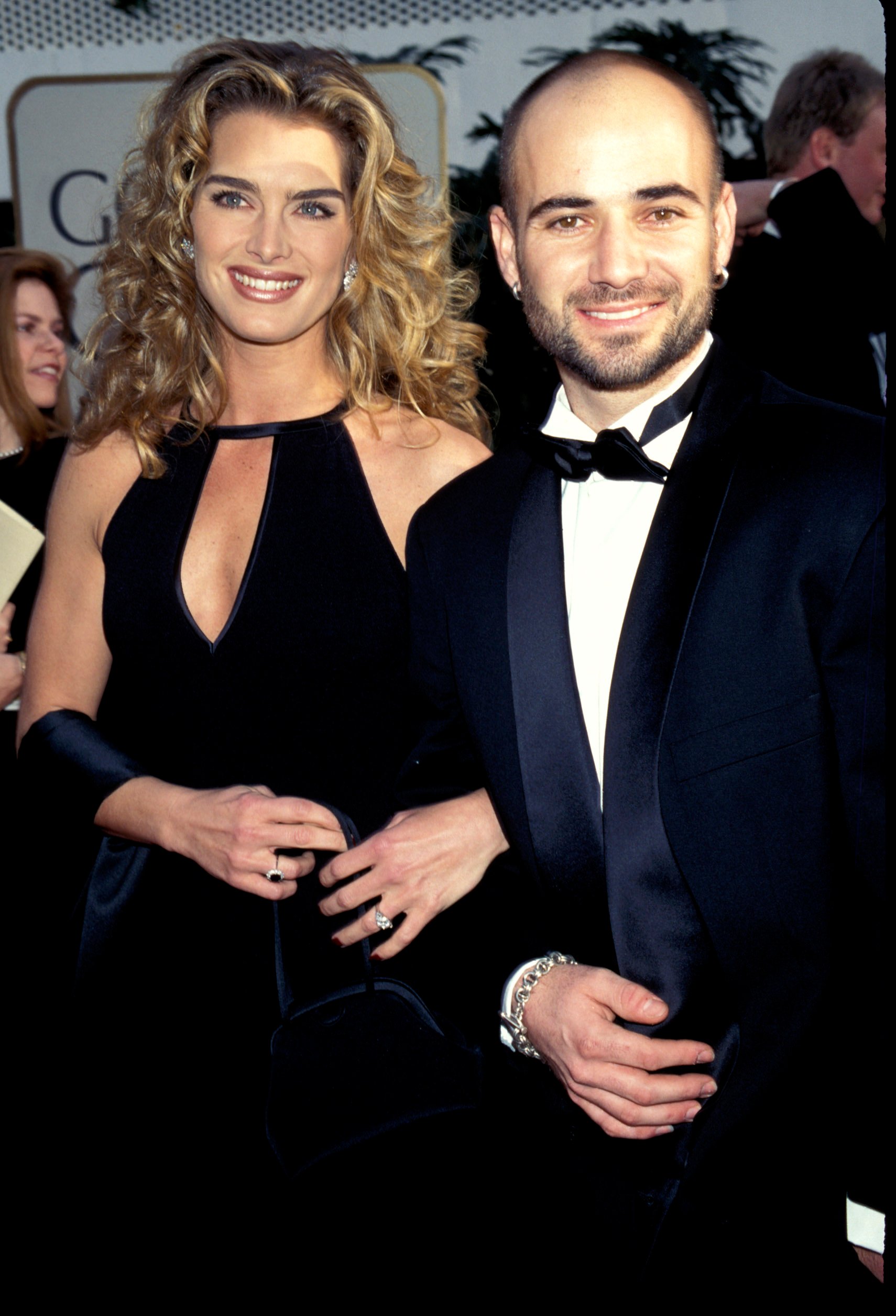 Andre Agassi and Brooke Shields arm in arm at the Golden Globe Awards in 1997