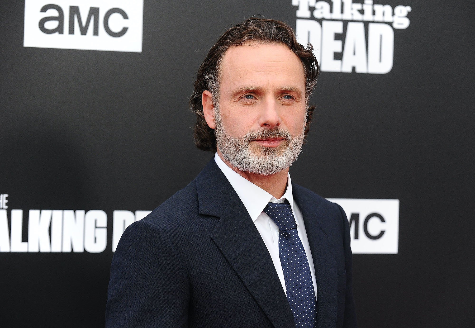 Andrew Lincoln smiling slightly