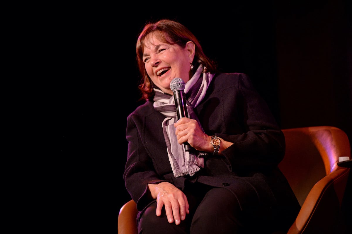 'Barefoot Contessa' star Ina Garten holds a microphone and laughs while at an event for The New Yorker in 2019