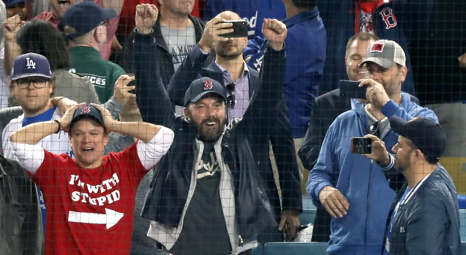Ben Affleck cheers at the Red Sox win the 2018 World Series