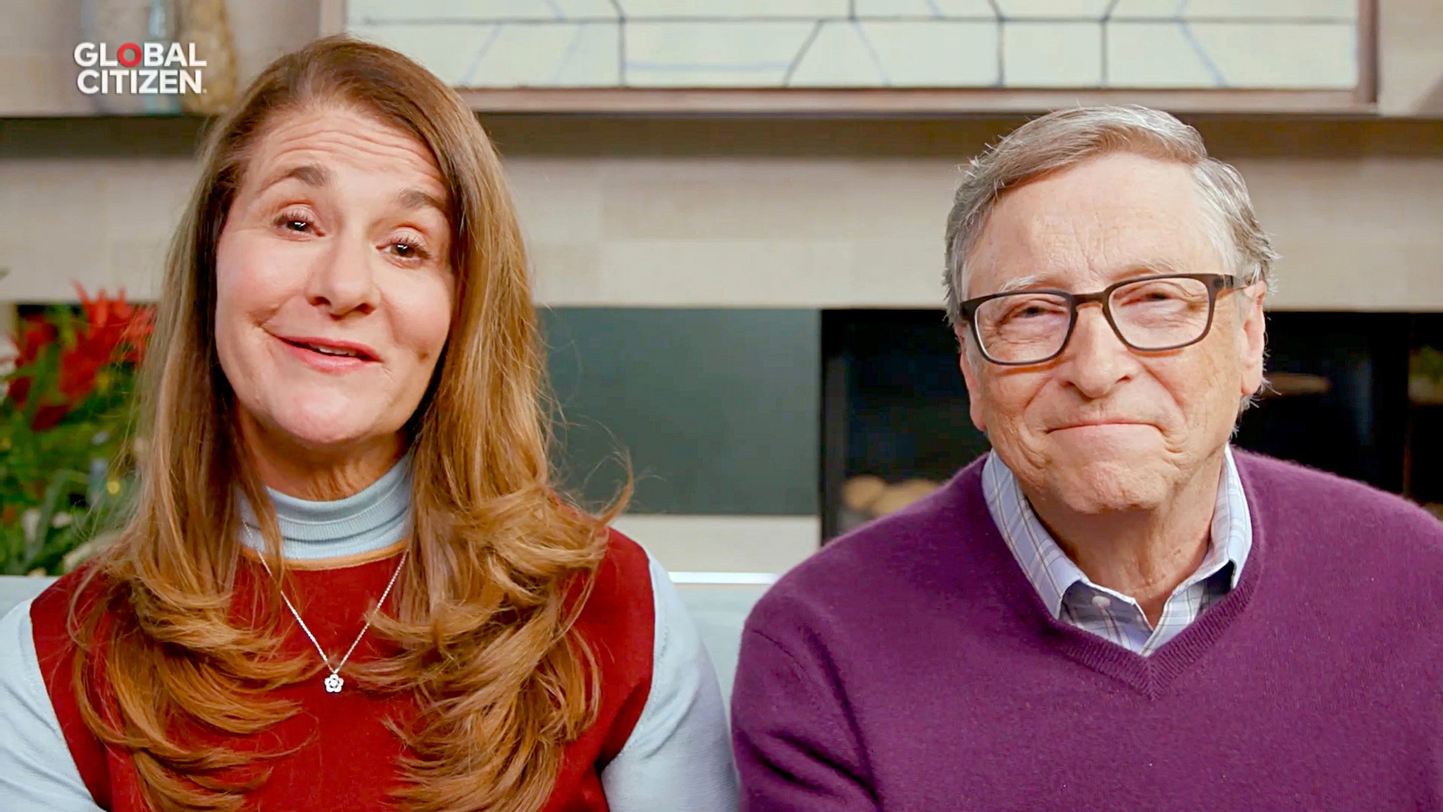 Melinda Gates and Bill Gates sitting together on a couch for an online event