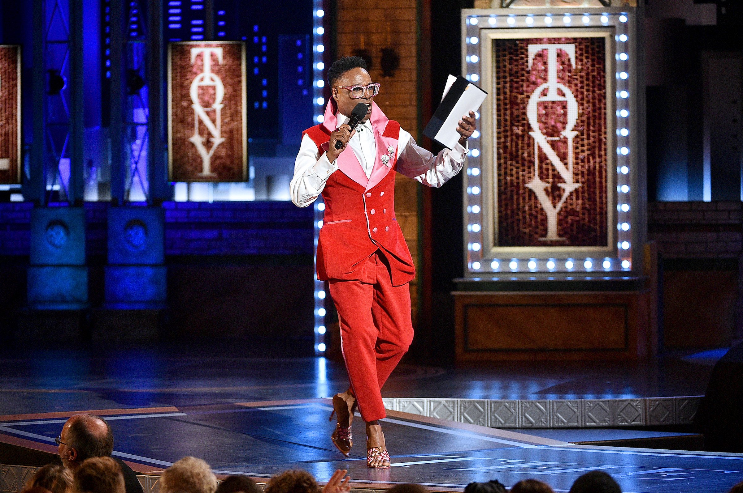 Billy Porter in a red suit performs on stage during the 2019 Tony Awards at Radio City Music Hall