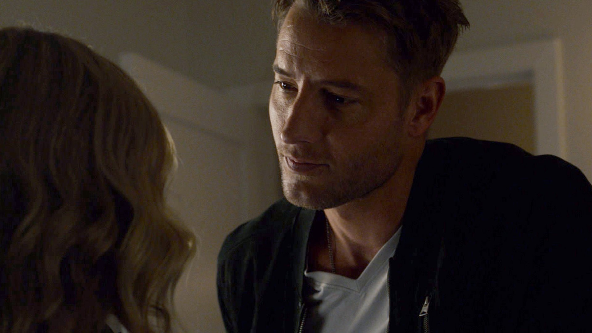 Justin Hartley as Kevin looking at Caitlin Thompson as Madison in ‘This Is Us’ Season 5 Episode 14
