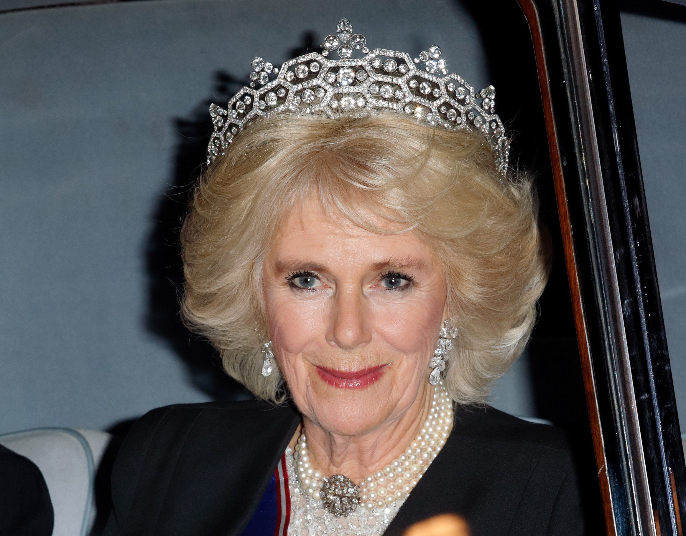 Camilla Parker Bowles attends the annual Diplomatic Reception at Buckingham Palace wearing pearls and a tiara