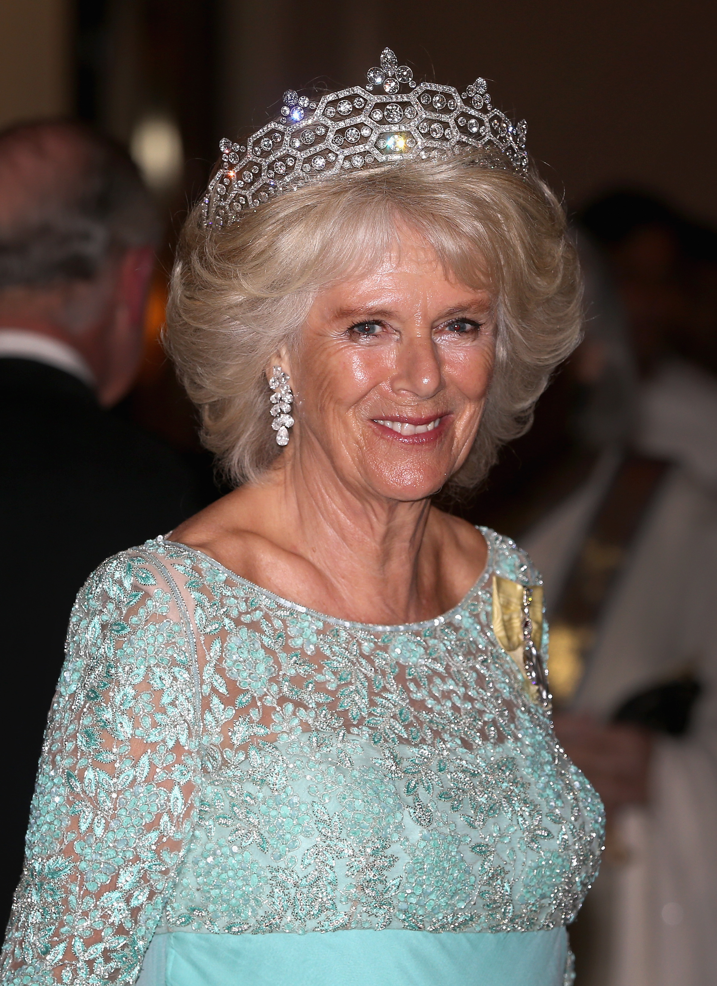 Camilla Parker Bowles in a baby blue gown and a tiara at the CHOGM Dinner at the Cinnamon Lakeside Hotel during the Commonwealth Heads of Government