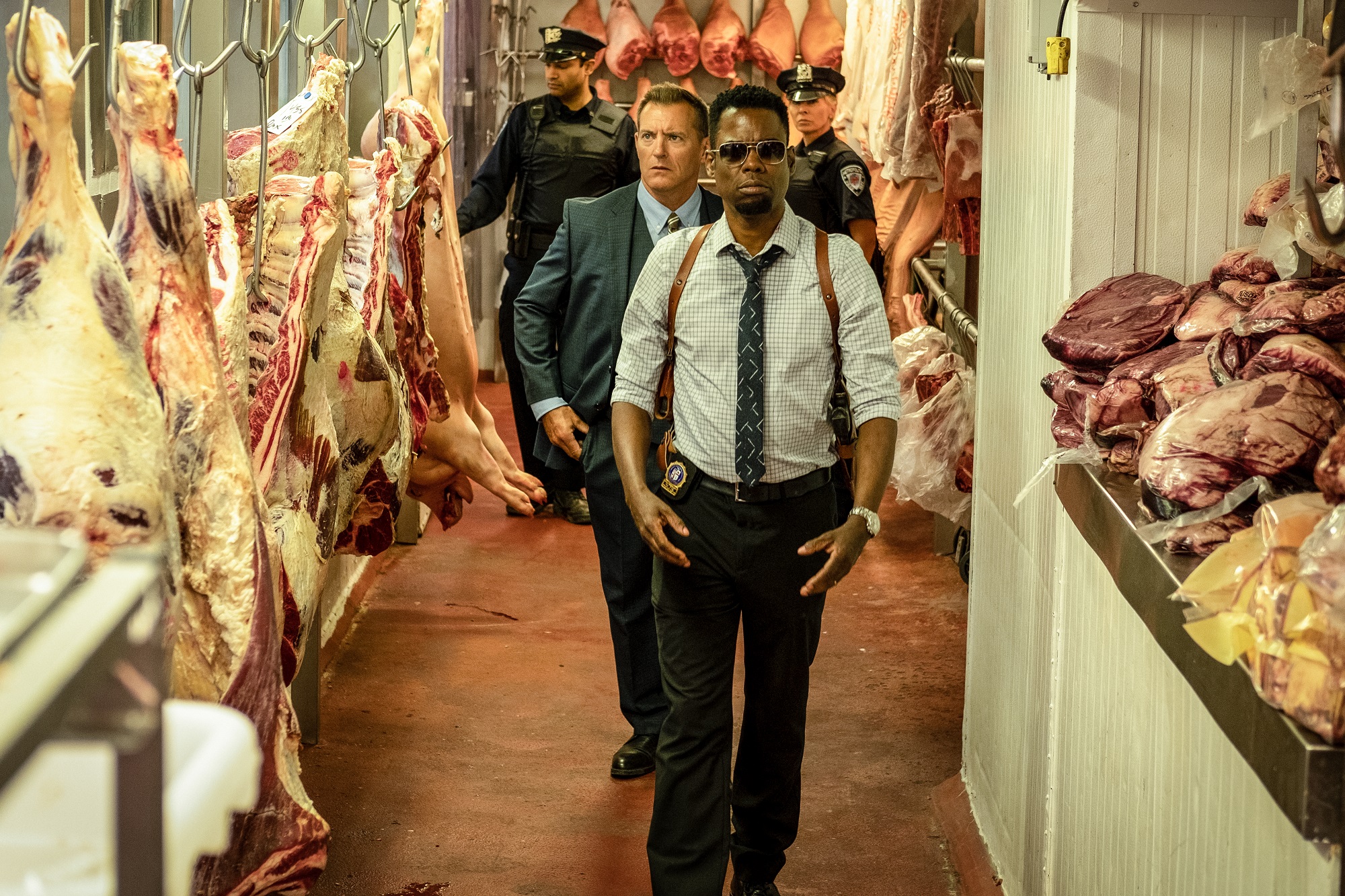 Chris Rock leads cops through a meat locker in Spiral