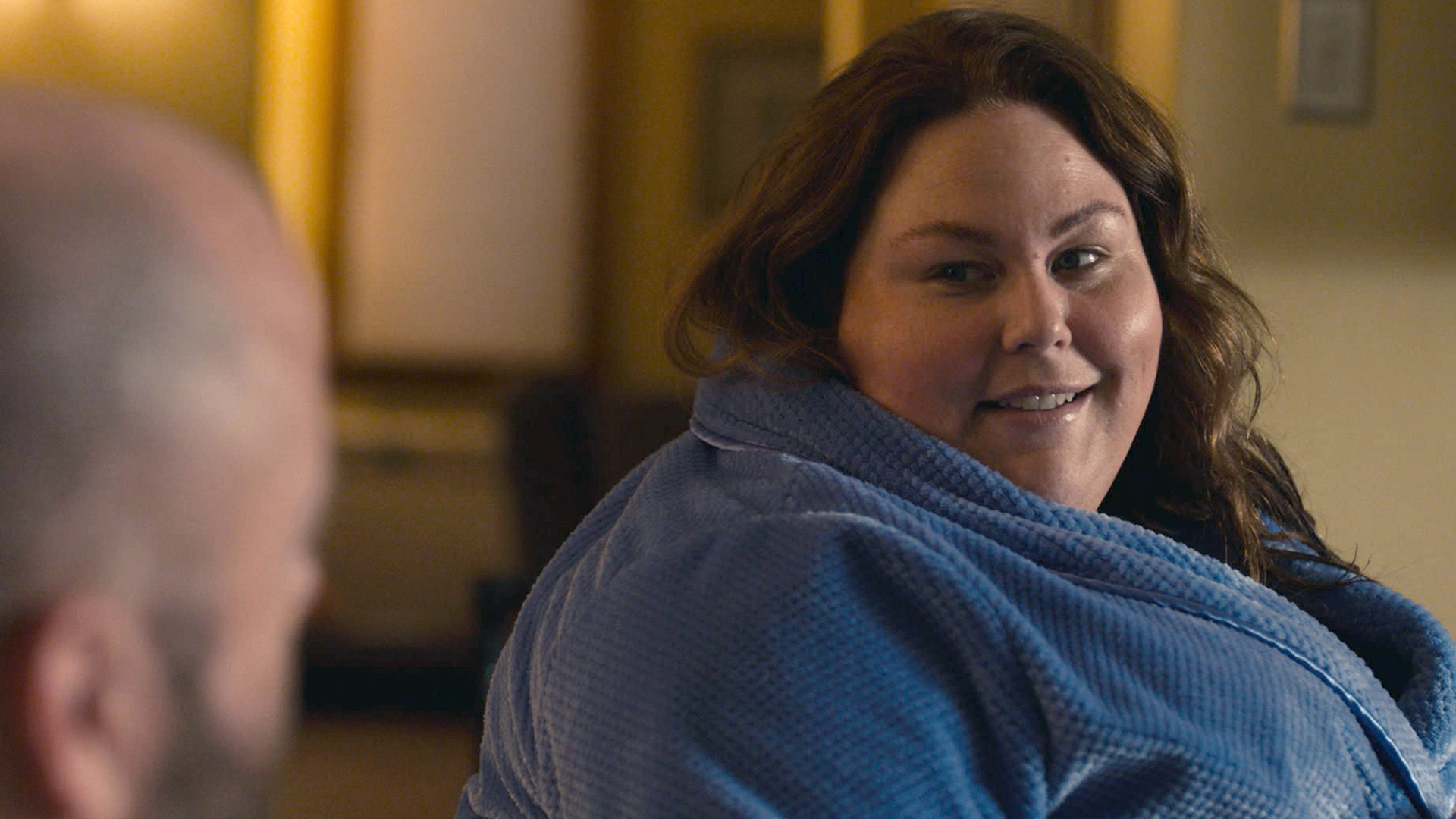 Chrissy Metz as Kate in a robe looking at Chris Sullivan as Toby in ‘This Is Us’ Season 5 Episode 14