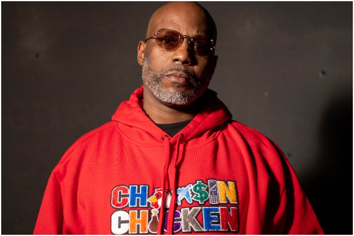 DMX wearing a red hoodie and sunglasses while posing during an episode of 'Uncensored.'