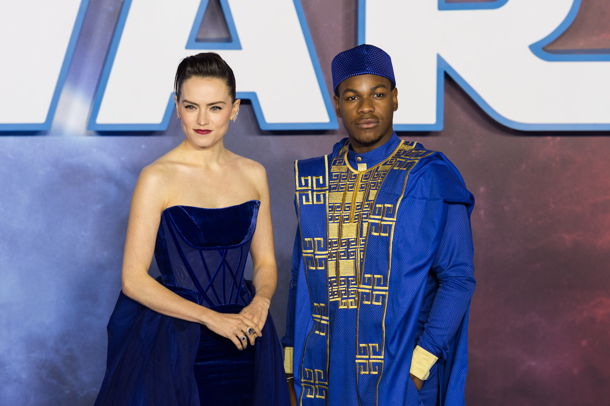 Daisy Ridley and John Boyega smiling