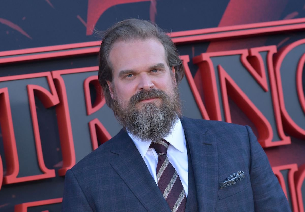 David Harbour poses for a photo on the red carpet at an event for his Netflix series 'Stranger Things'