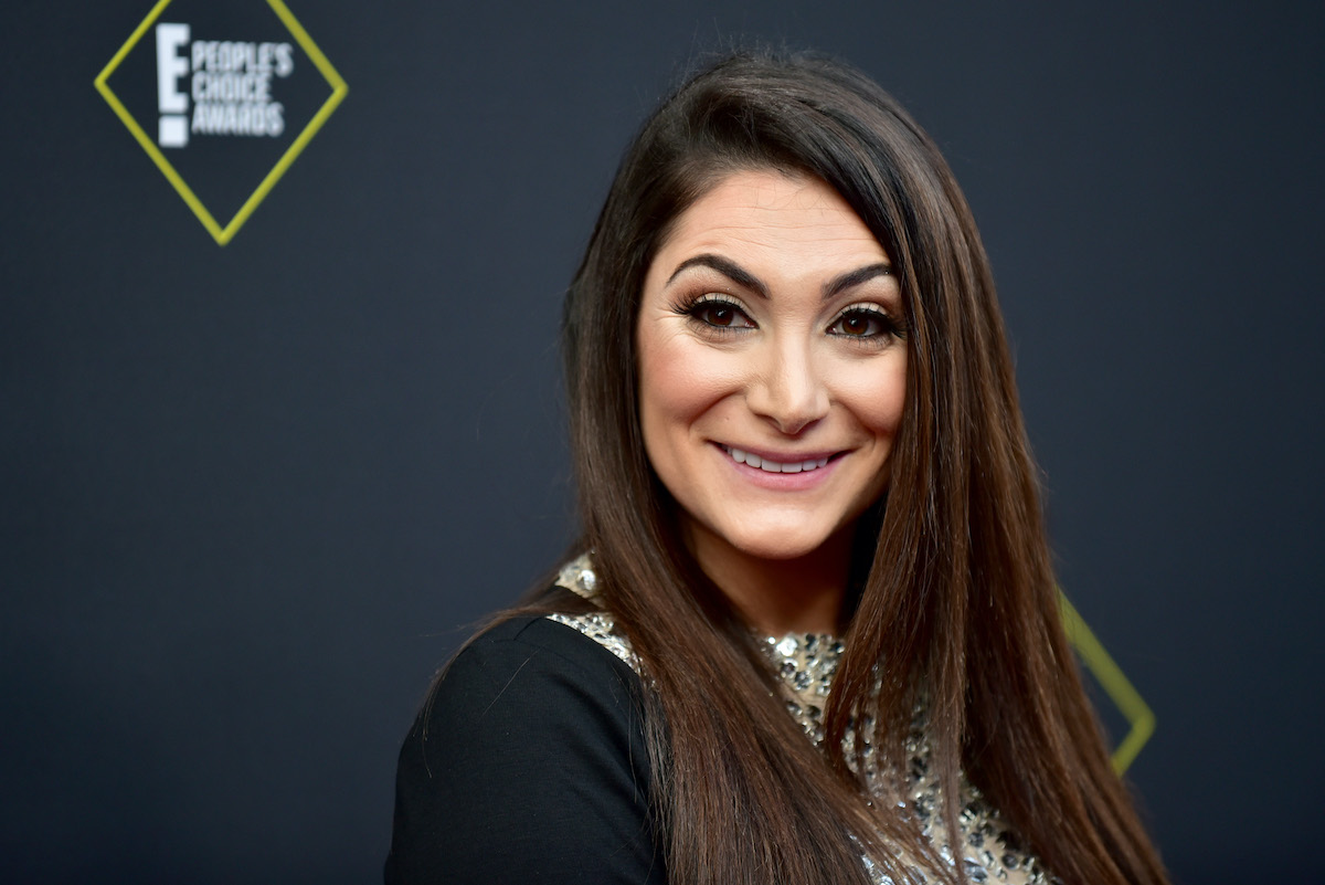 Deena Cortese from 'Jersey Shore: Family Vacation' smiling - she recently had to defend her son on social media