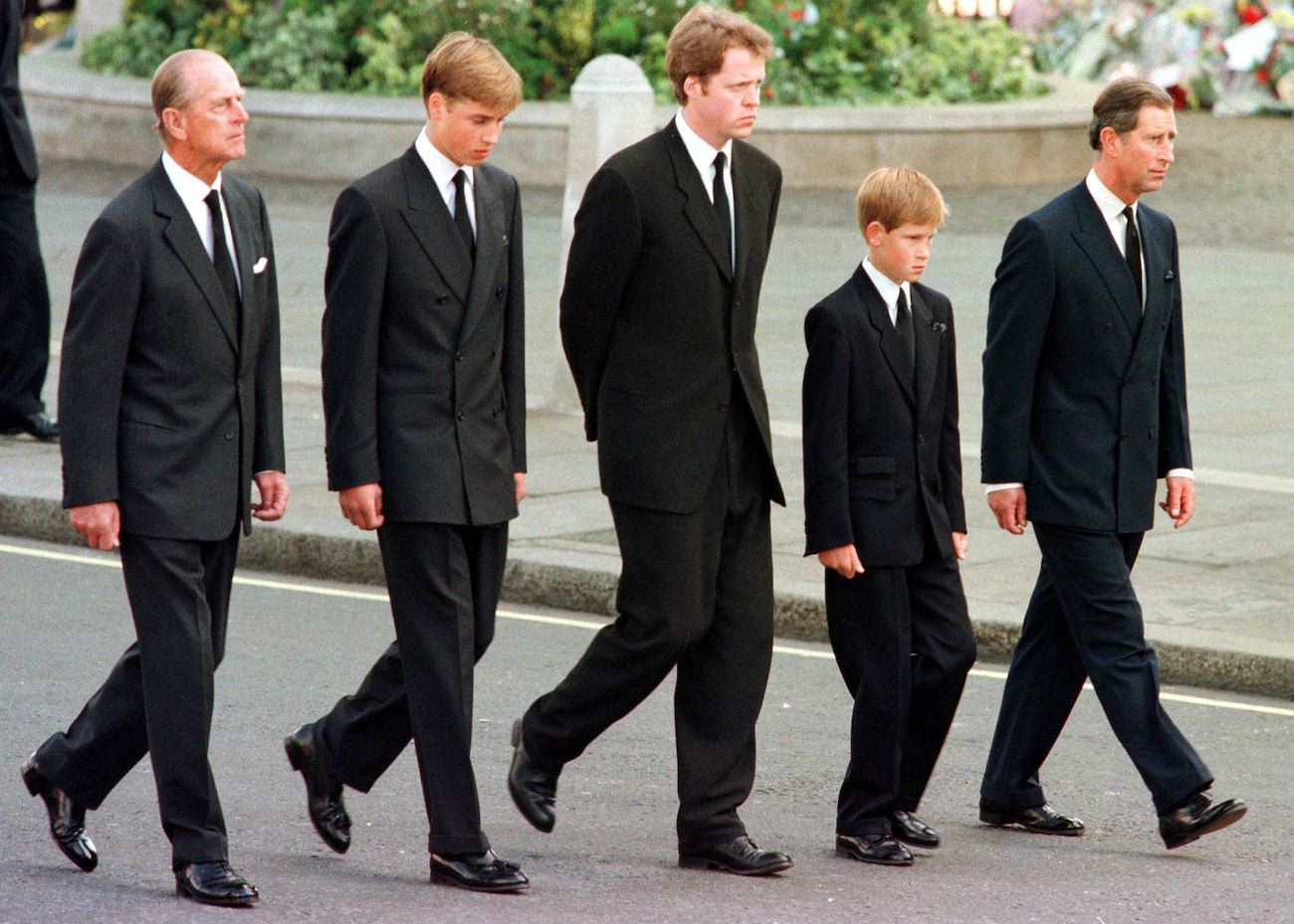 Prince Harry and family members walking at Princess Diana's funeral