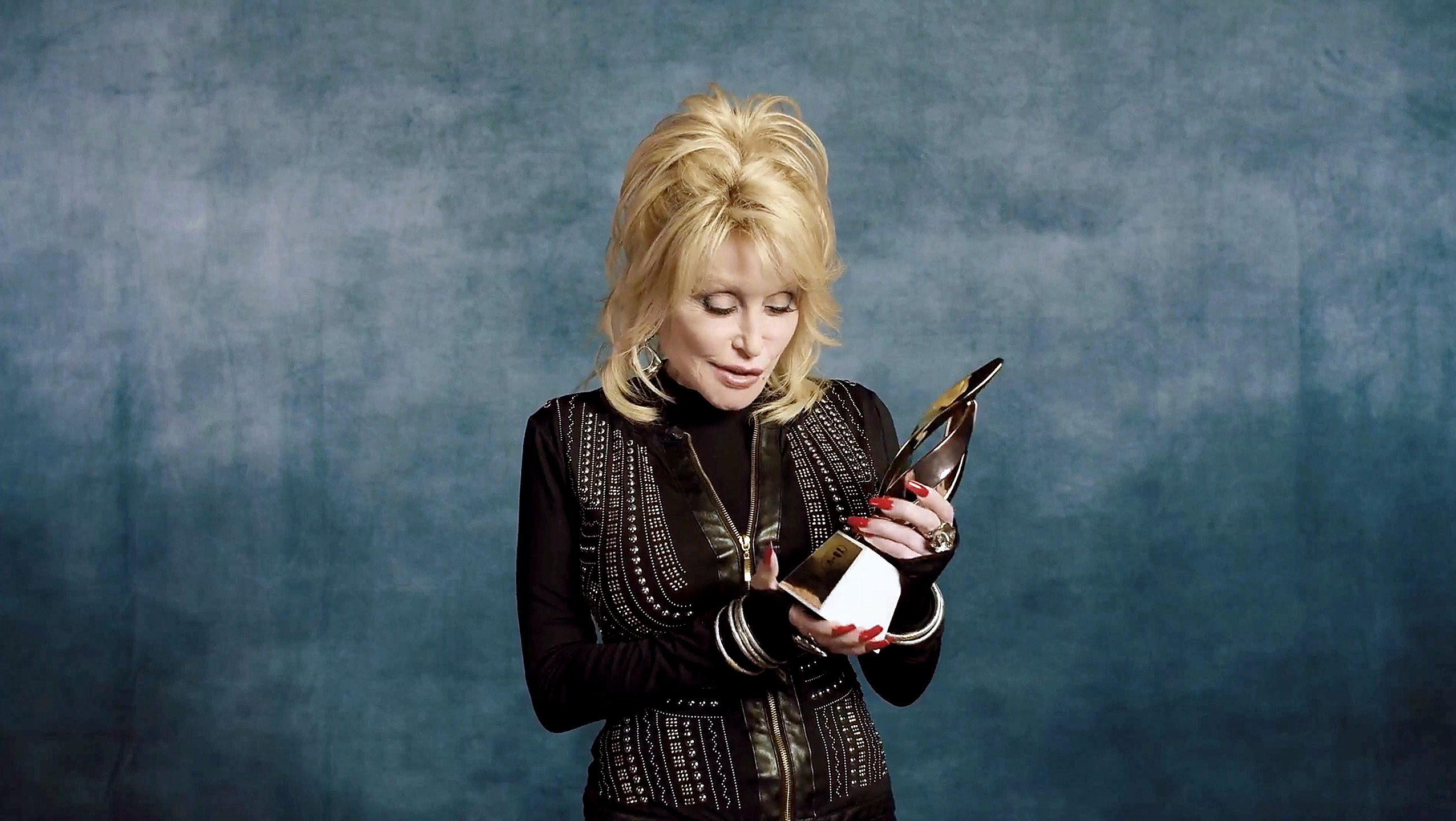 Dolly Parton accepts the Hitmaker Award during the Billboard Women In Music 2020 event on December 10, 2020.