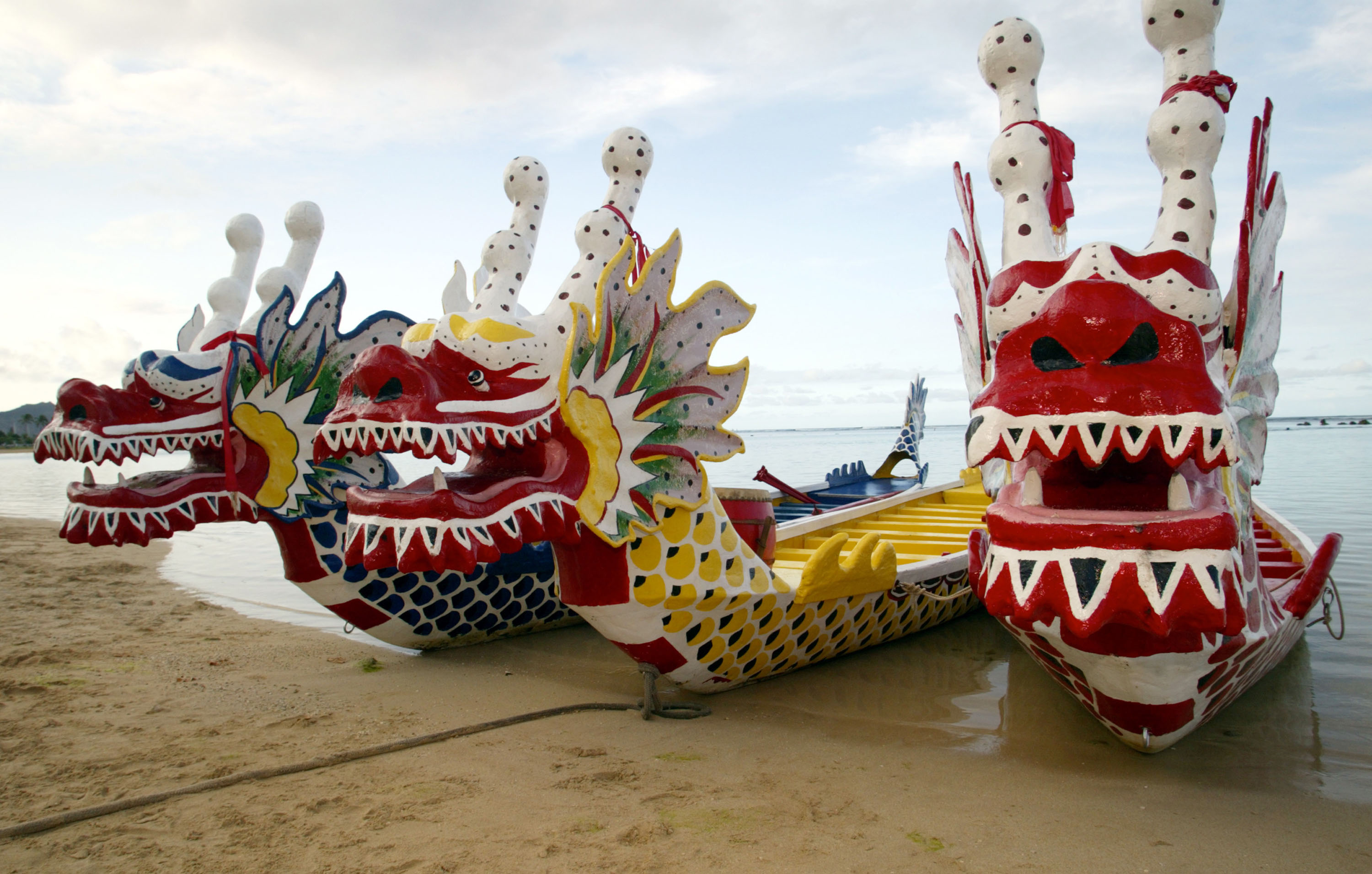 Dragon boats wait for racers ahead of the Dragon Boat Festival in Honolulu Hawaii