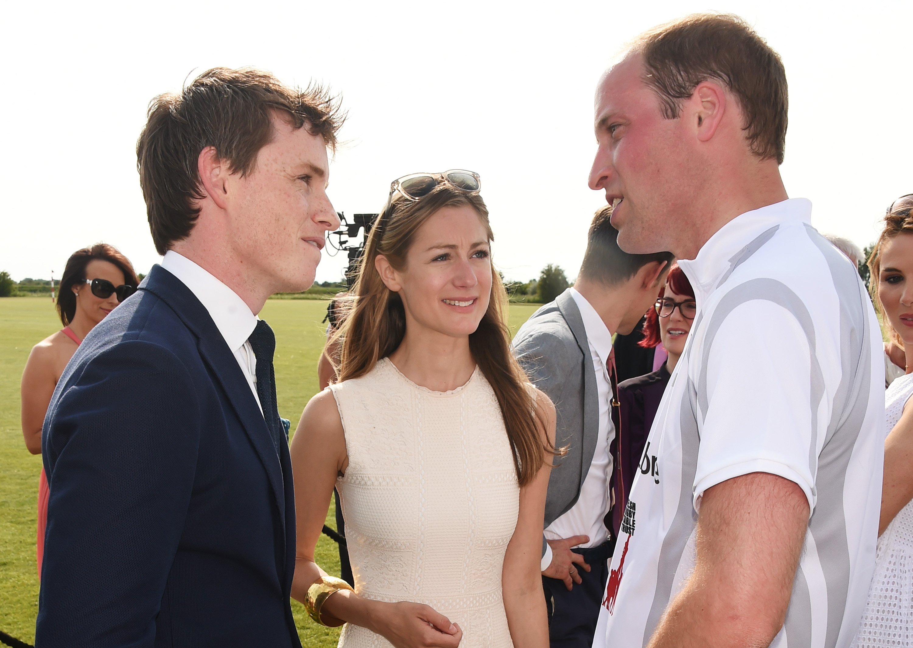 Eddie Redmayne, Hannah Bagshawe, and Prince William chatting at the Audi Polo Challenge in 2015