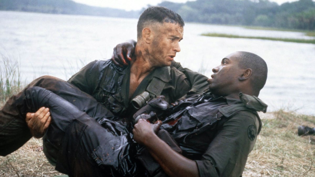 Tom Hanks as Forrest Gump looks down on his wounded friend Bubba (Mykelti Williamson) in a scene from 'Forrest Gump'