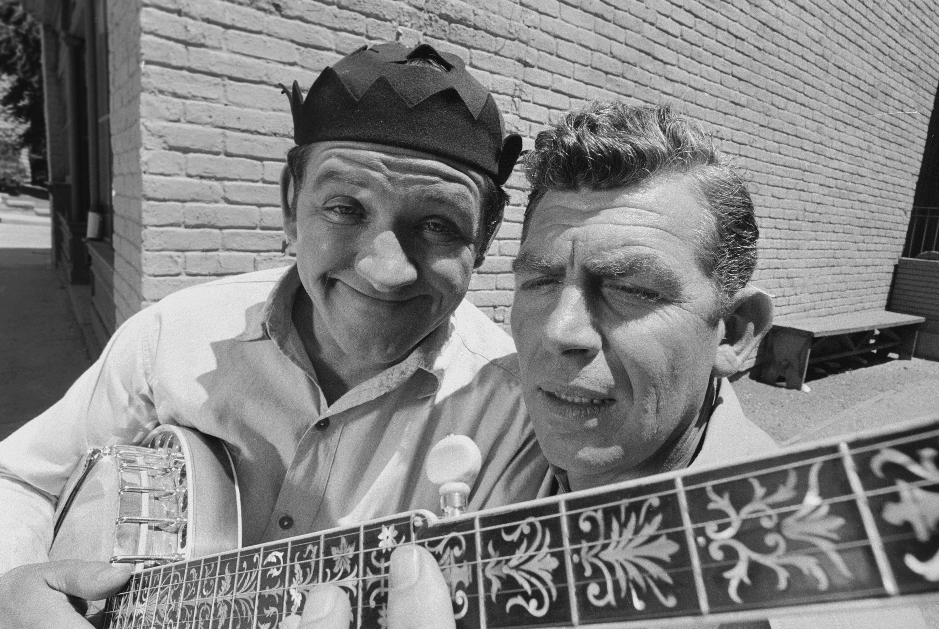 Actors George Lindsey as Goober Pyle and Andy Griffith as Sheriff Andy Taylor in a photo from 'The Andy Griffith Show'