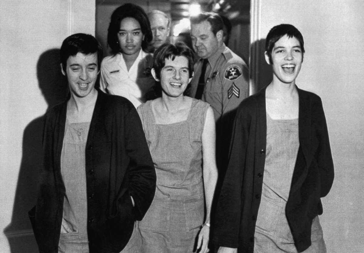 Susan Atkins, (left), Patricia Krenwinkel, and Leslie Van Houten,(right), laugh after receiving the death sentence for their part in the Tate-LaBianca killing at the order of Charles Manson.
