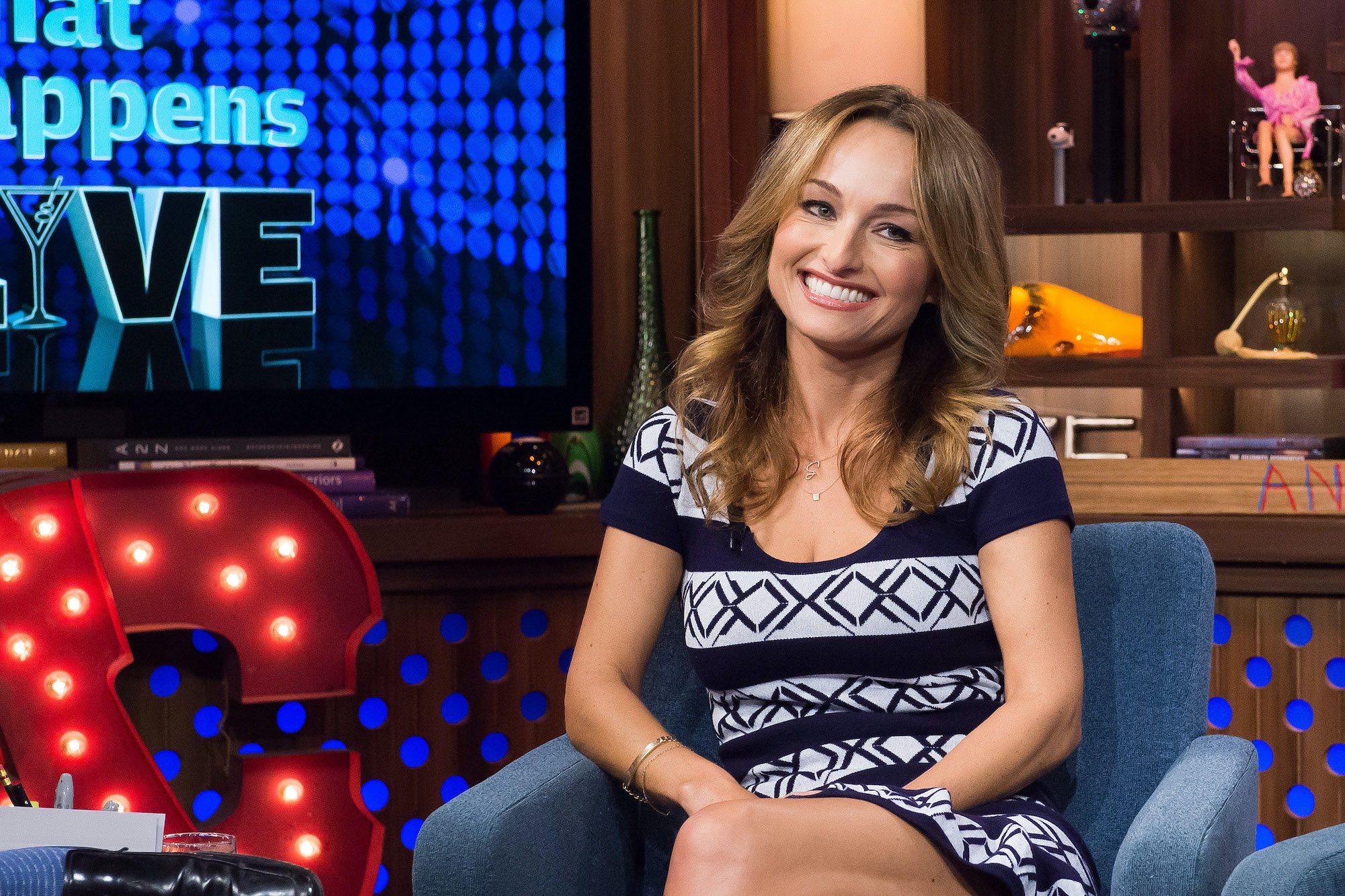 Giada De Laurentiis smiling, seated