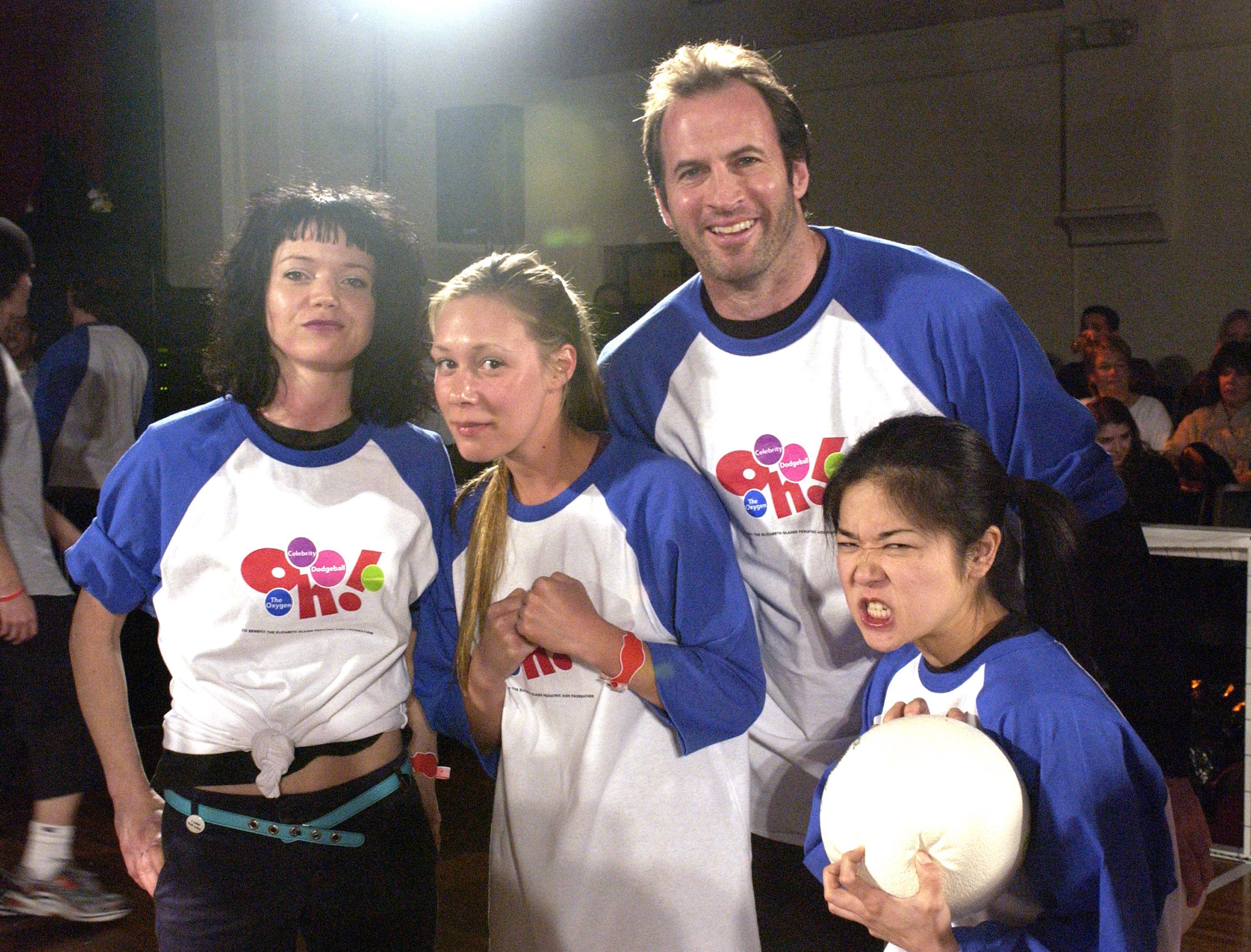 Shelly Cole, Liza Weil, Scott Patterson, and Keiko Agena, as Team WB, pose for a photo at Oxygen's Celebrity Dodgeball Tournament in 2003.