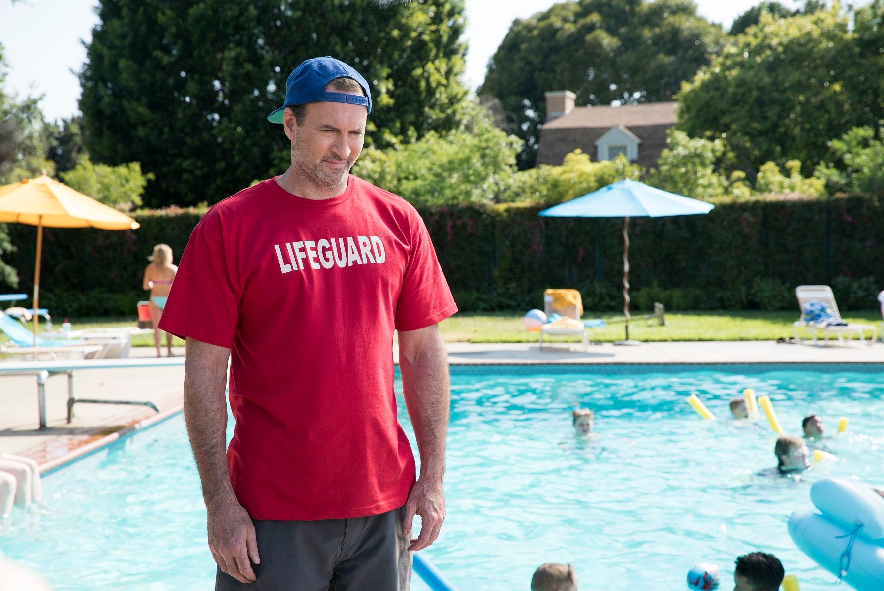 Scott Patterson stands in front of the Stars Hollow pool in 'Gilmore Girls: A Year in the Life' 