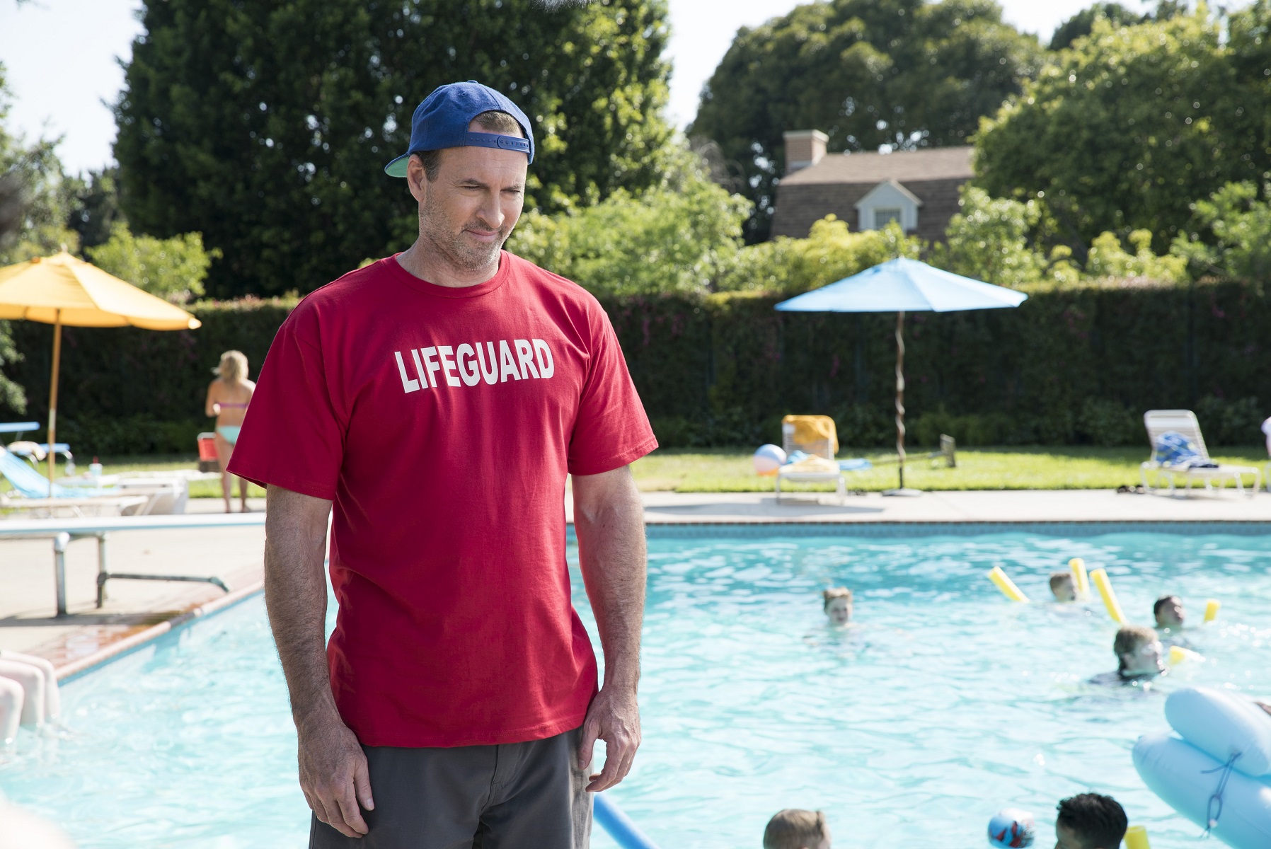 Scott Patterson stands in front of the Stars Hollow pool in 'Gilmore Girls: A Year in the Life'