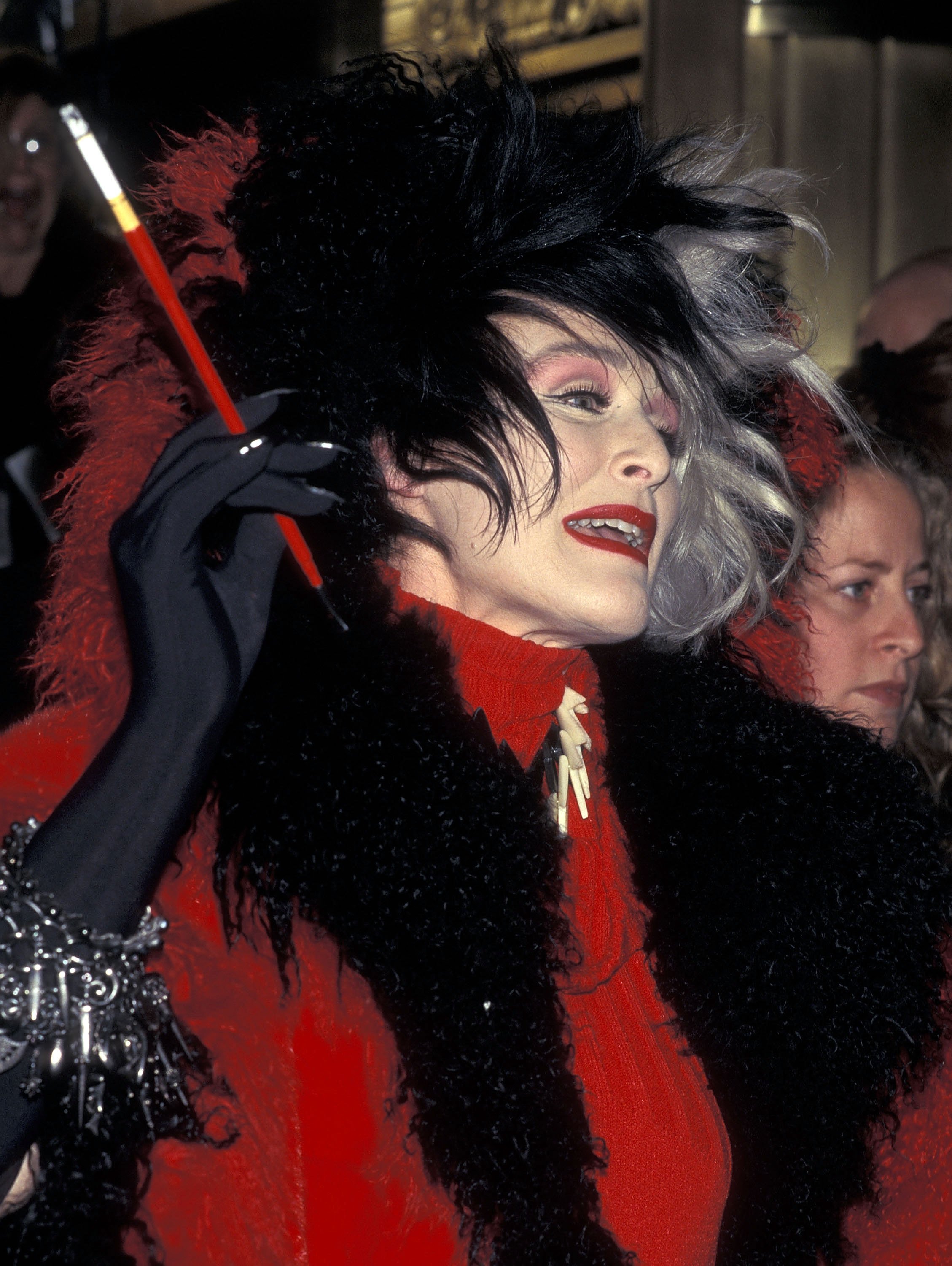 Glenn Close attends the 101 Dalmations premiere as Cruella de Vil