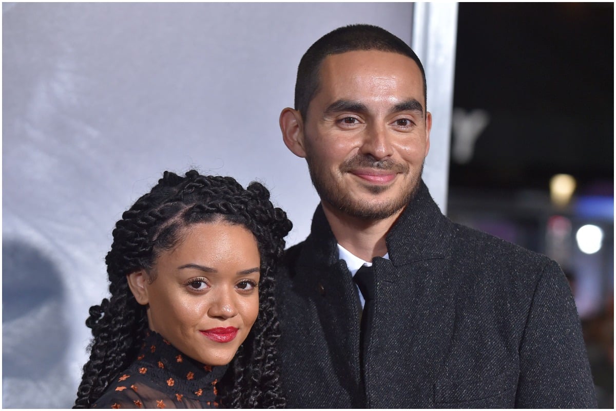 'Good Girls' star Manny Montana smiling with his wife, Adelfa Marr, at an event.