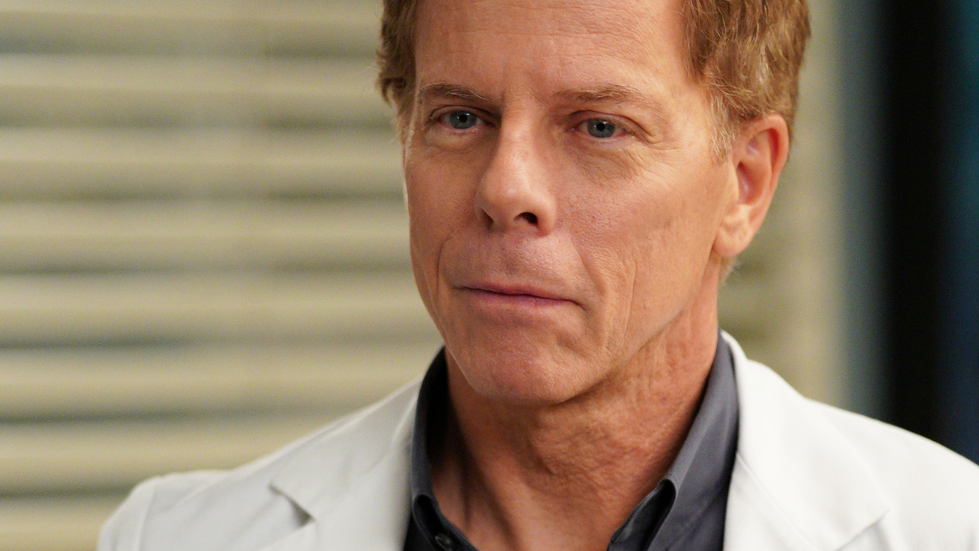 Greg Germann as Tom Koracick smirking in ‘Grey’s Anatomy’