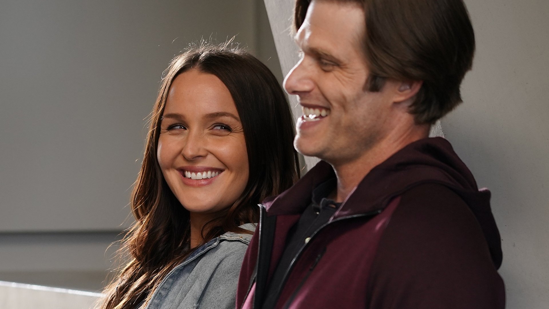 Camilla Luddington as Jo Wilson and Chris Carmack as Atticus “Link” Lincoln laughing in ‘Grey’s Anatomy’ Season 17 Episode 16, ‘I’m Still Standing’