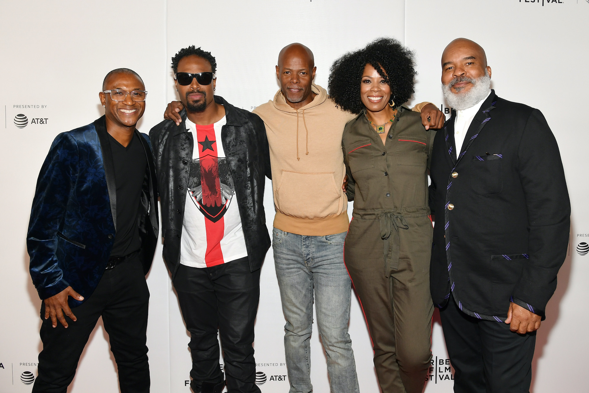 'In Living Color' cast at the 25th anniversary, smiling in front of a white background