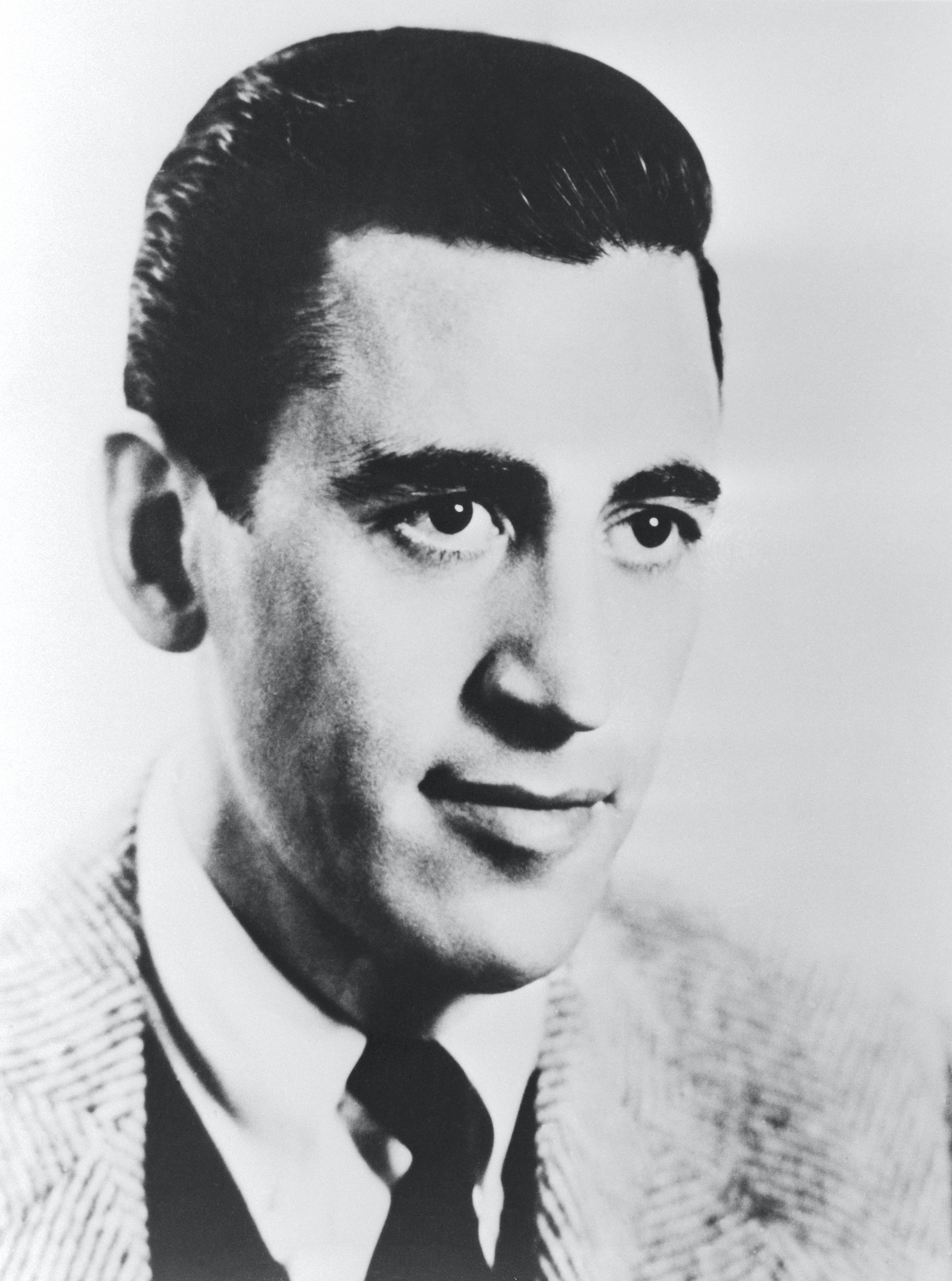J.D. Salinger in black and white, looking off camera