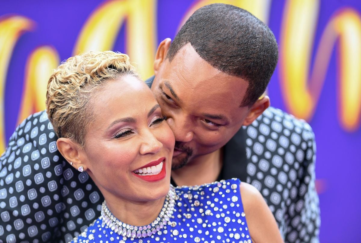 Will Smith snuggles up to Jada Pinkett Smith at the 'Aladdin' premiere