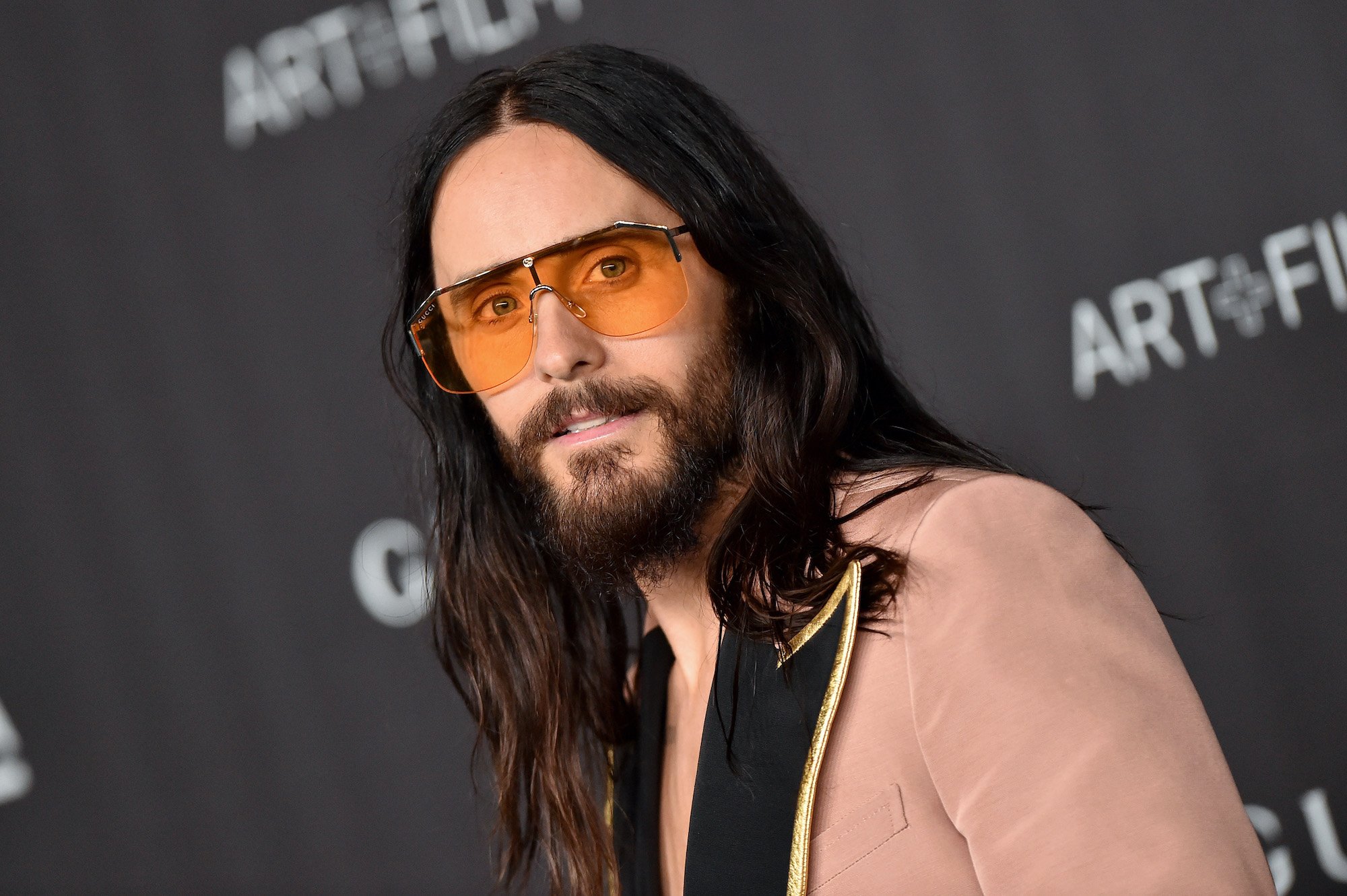 Jared Leto wearing yellow sunglasses