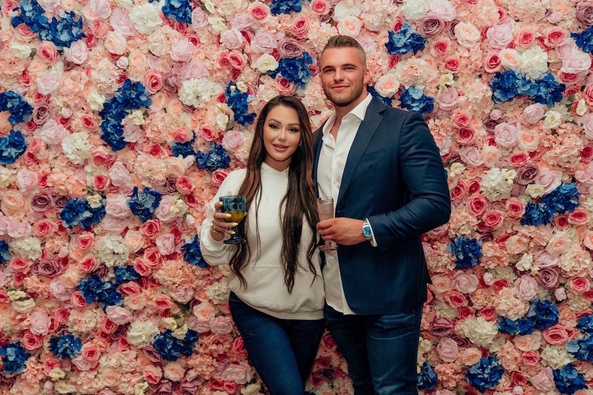 Jenni 'JWoww' Farley and Zack '24' Carpinello at the grand opening of her store Heavenly Flower 