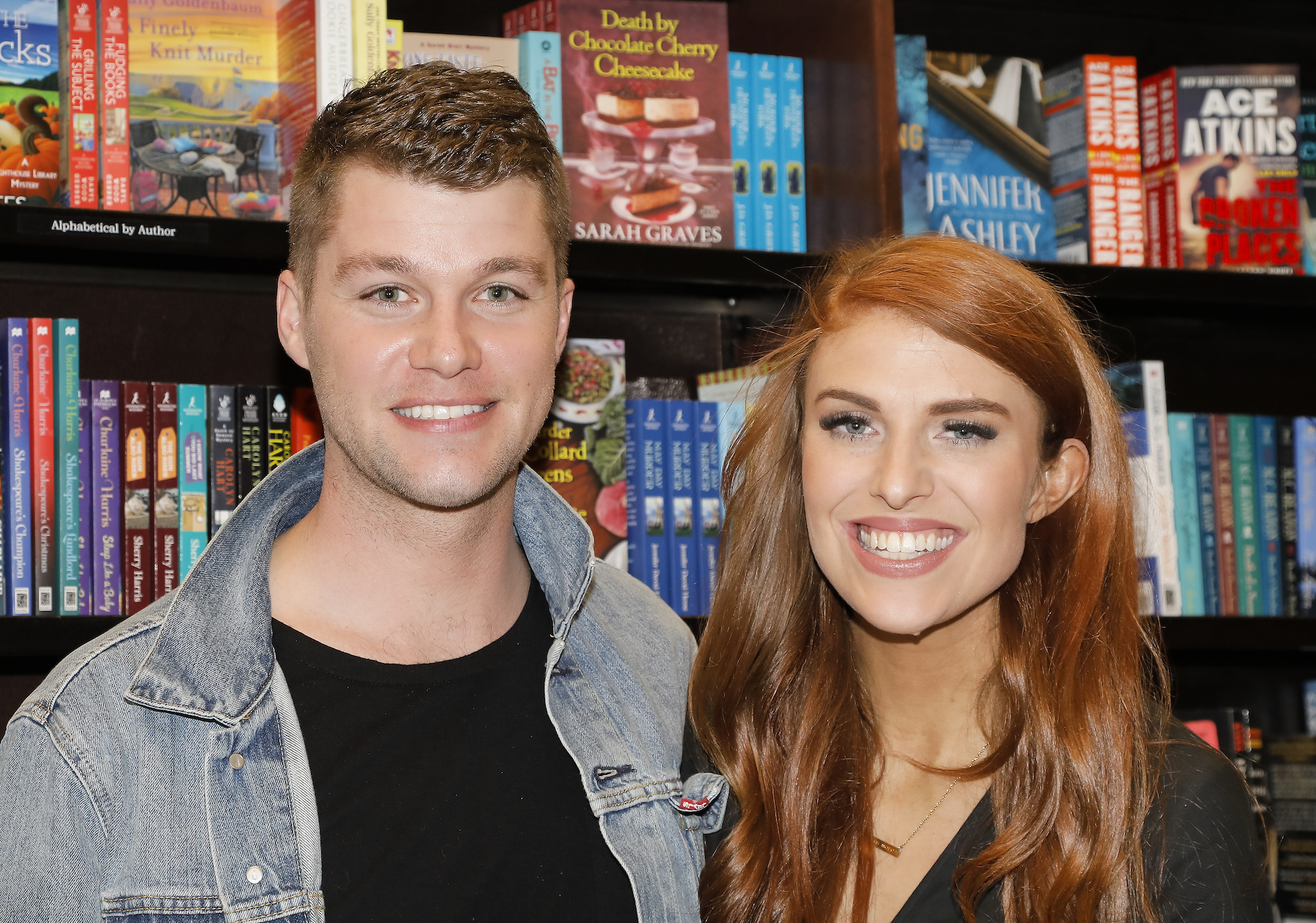 Jeremy and Audrey Roloff from 'Little People, Big World' standing together and smiling as they celebrate their new memoir