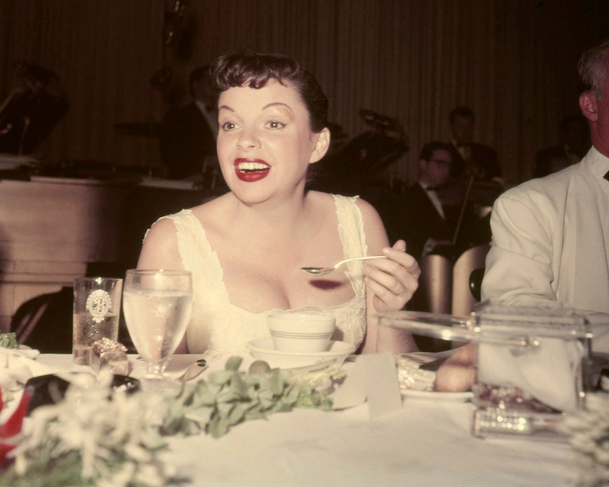 American actress and singer Judy Garland (1922 - 1969) eating soup, circa 1955. 