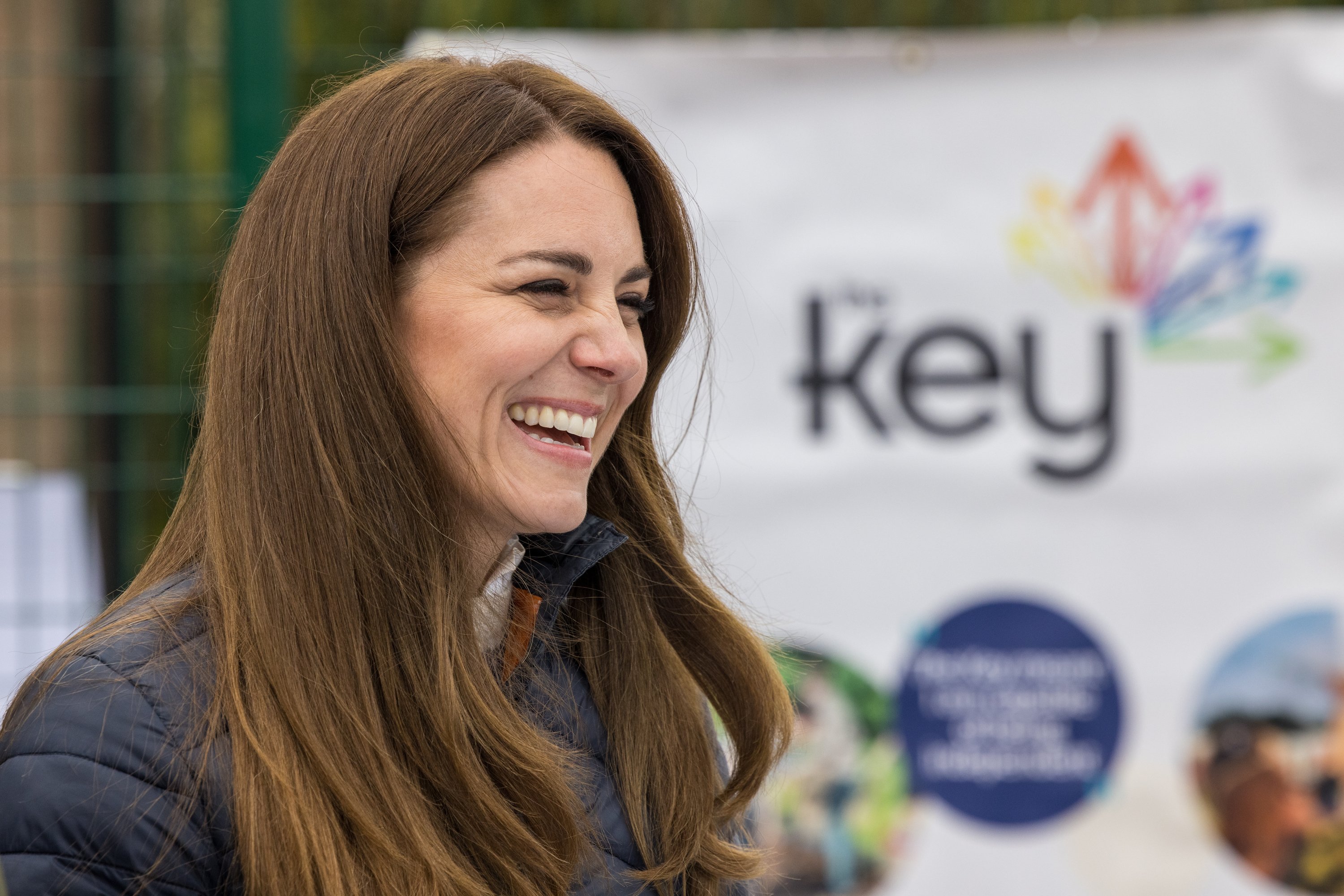 Kate Middleton laughing at engagement where she met young people supported by the Cheesy Waffles Project