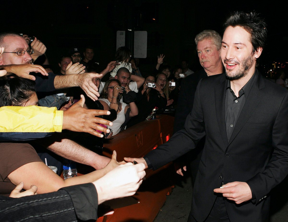 Keanu Reeves greets fans at the 'Constantine' premiere