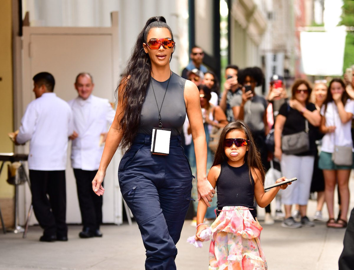 Kim Kardashian and North West walking down the street