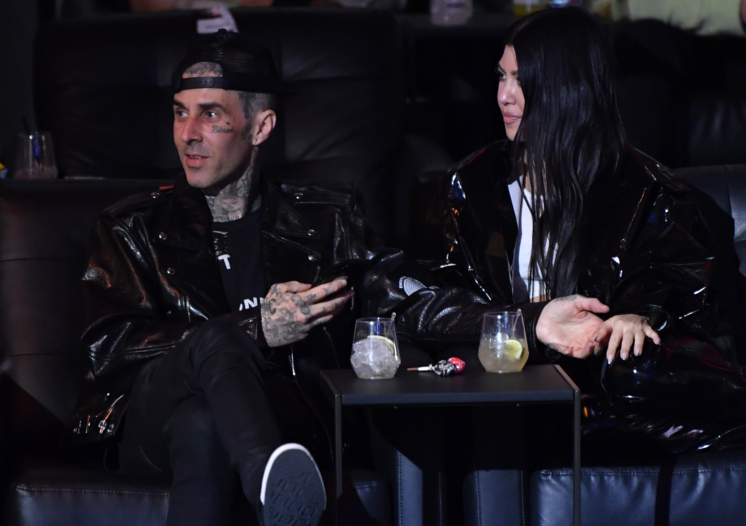 Travis Barker and Kourtney Kardashian are photographed at the UFC 260 Event at UFC Apex