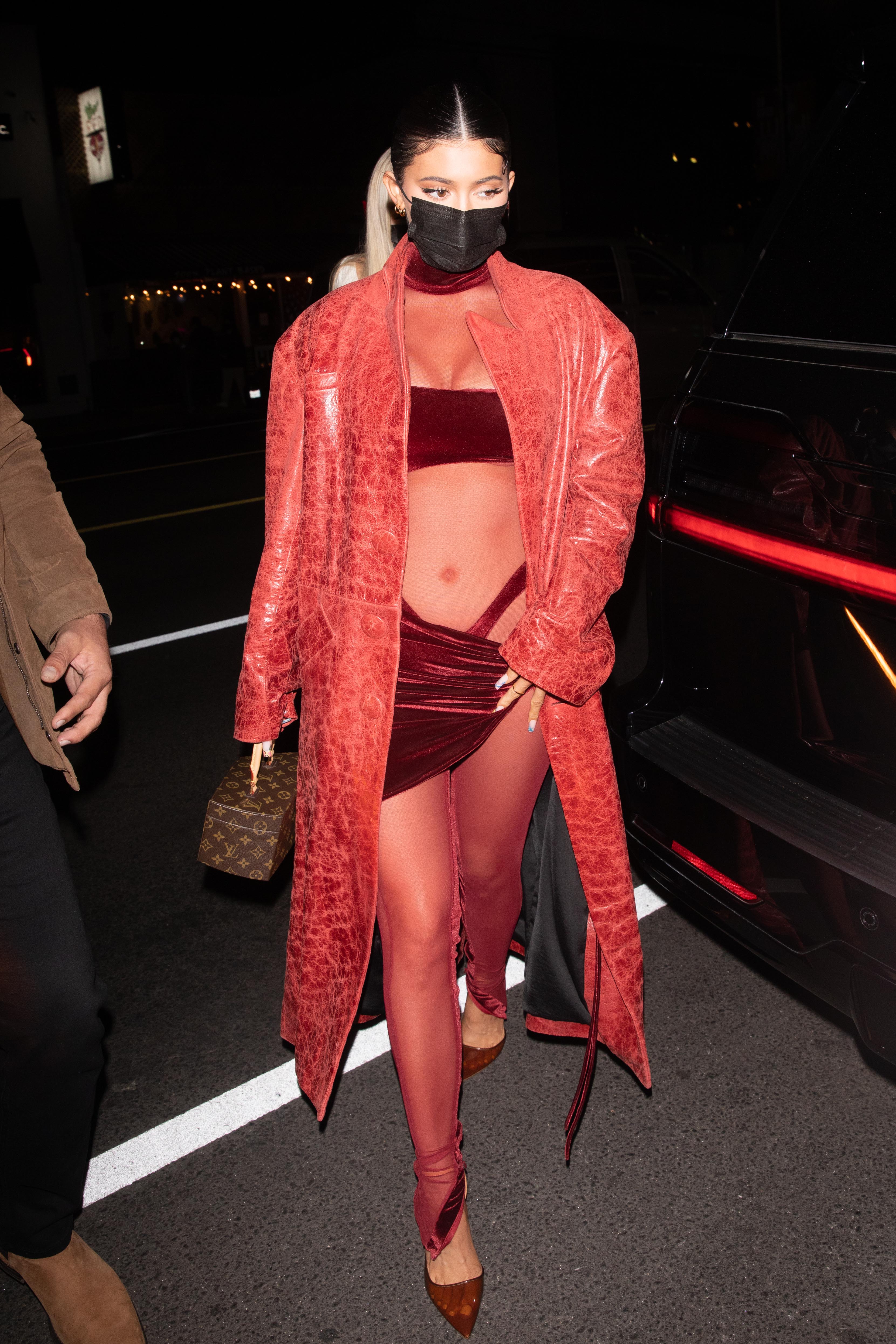 Kylie Jenner seen arriving at The Nice Guy in burgundy ensemble